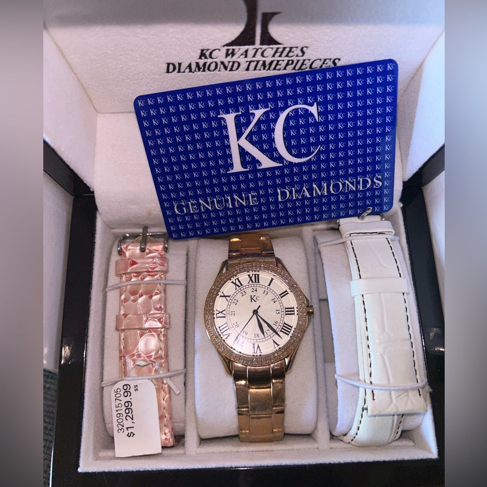 KC watch rose gold with interchangeable bands.
